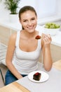 Woman Eating Cake. Beautiful Female Eating Dessert