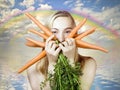 Woman eating carrots