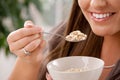 Woman eating cereal