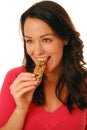 Woman eating cereal bar Royalty Free Stock Photo