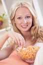 Woman eating chips Royalty Free Stock Photo
