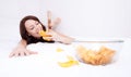 Woman eating chips Royalty Free Stock Photo