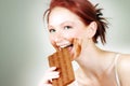 Woman eating chocolate Royalty Free Stock Photo