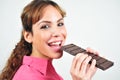 Woman eating chocolate Royalty Free Stock Photo