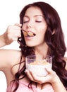 Woman eating cornflakes