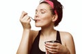 Woman eating a delicious ice cream with chocolate