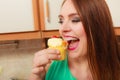 Woman eating delicious sweet cake. Gluttony.