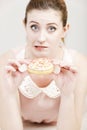 Woman eating a doughnut Royalty Free Stock Photo