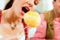 Woman eating dumplings in Bavarian restaurant