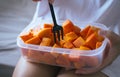 Woman eating fresh fruits papaya slice,Concept healthy food Royalty Free Stock Photo