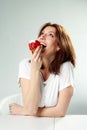 Woman eating fresh strawberry cake Royalty Free Stock Photo