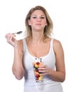 Woman eating fruit