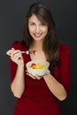 Woman eating a fruit salad Royalty Free Stock Photo