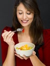 Woman eating a fruit salad Royalty Free Stock Photo