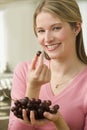 Woman Eating Grapes Royalty Free Stock Photo