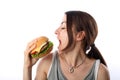 Woman eating hamburger