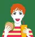 Woman eating hamburger and drinking lemonade