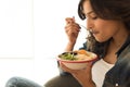 Woman eating a healthy bowl Royalty Free Stock Photo