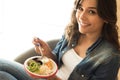 Woman eating a healthy bowl Royalty Free Stock Photo