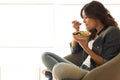 Woman eating a healthy bowl Royalty Free Stock Photo