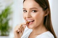 Woman Eating Healthy Diet Food In Kitchen Royalty Free Stock Photo
