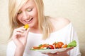 Woman eating healthy food, Greek salad Royalty Free Stock Photo