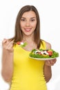 Woman eating healthy food, Greek salad Royalty Free Stock Photo