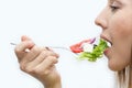 Woman eating healthy food, Greek salad Royalty Free Stock Photo