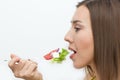 Woman eating healthy food, Greek salad Royalty Free Stock Photo