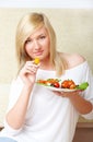 Woman eating healthy food, vegetable salad Royalty Free Stock Photo