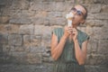 Woman eating ice cream outside Royalty Free Stock Photo