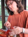 Woman Eating Lobster