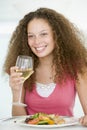 Woman Eating meal,mealtime With A Glass Of Wine Royalty Free Stock Photo