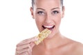 Woman eating muesli bar snack Royalty Free Stock Photo