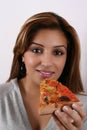 Woman eating pizza Royalty Free Stock Photo