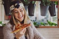 Woman eating pizza in the restaurant Royalty Free Stock Photo