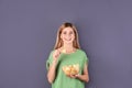 Woman eating potato chips Royalty Free Stock Photo