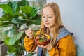 Woman eating Raw Organic Poke Bowl with Rice and Veggies close-up on the table. Top view from above horizontal Royalty Free Stock Photo