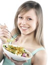 Woman eating salad