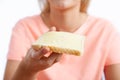 Woman Eating Slice Of White Bread With Margarine Royalty Free Stock Photo