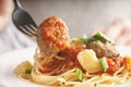 Woman eating spaghetti with meatballs Royalty Free Stock Photo