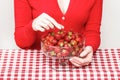 Woman eating strawberries Royalty Free Stock Photo