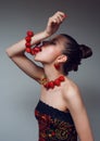 Woman eating strawberry bracelet Royalty Free Stock Photo