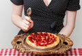 Woman eating strawberry tart Royalty Free Stock Photo