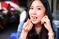 Woman eating Chinese steamed dumpling Royalty Free Stock Photo