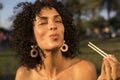 Woman eating sushi in the park Royalty Free Stock Photo