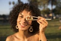 Woman eating sushi in the park Royalty Free Stock Photo