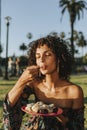 Woman eating sushi in the park Royalty Free Stock Photo