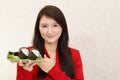 Woman eating sushi Royalty Free Stock Photo