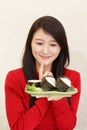 Woman eating sushi Royalty Free Stock Photo